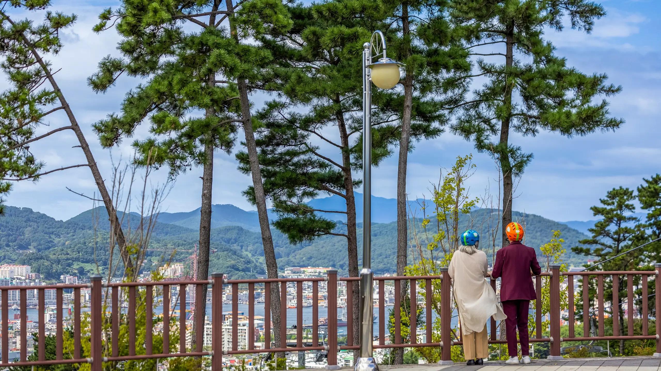 Guests enjoying a peaceful scenic view at Skyline Luge Tongyeong.
