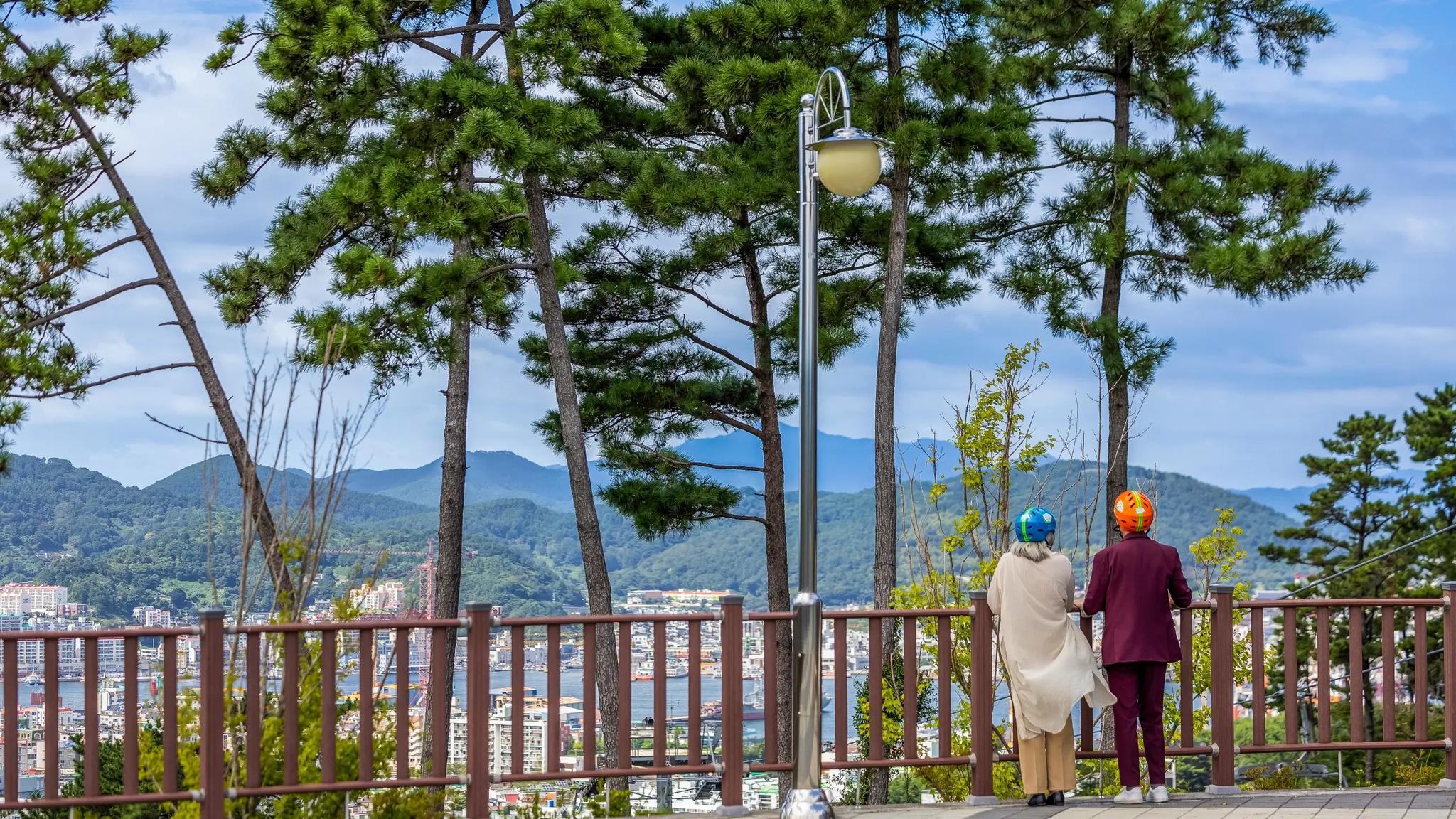 Guests enjoying a peaceful scenic view at Skyline Luge Tongyeong.