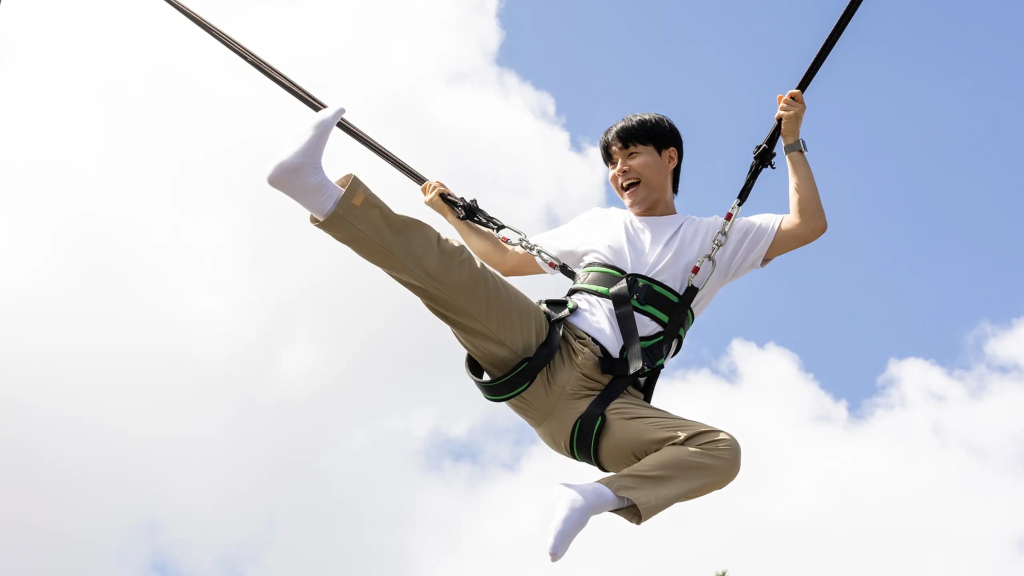 Guest enjoying an exciting bungee-style jump experience at Skyline Luge Tongyeong.